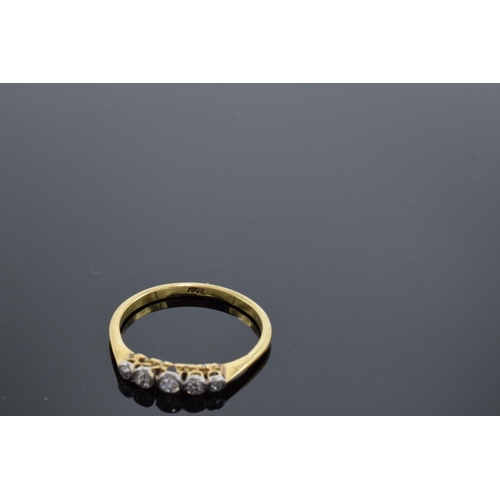 468 - 18ct gold and 5-stone diamond ring. 26 points. 2.5 grams. UK size T/U.