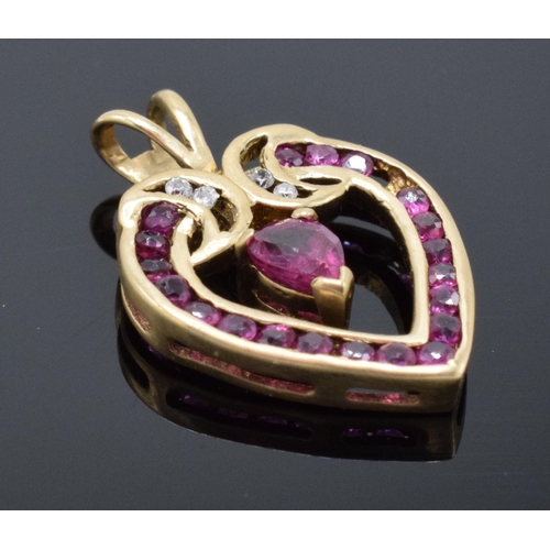 471 - 9ct gold, ruby and diamond heart-shaped pendant. 1.2 grams.