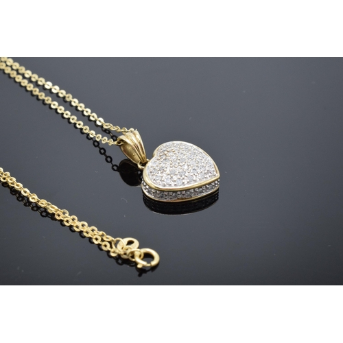 474 - 9ct yellow gold and diamond heart pendant on a 9ct gold chain. Total weight 3.7 grams. In good condi... 