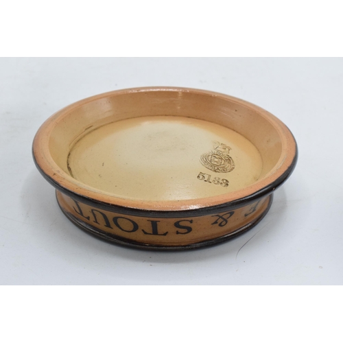 48 - A pair of Royal Doulton stoneware advertising ash trays to include Whitbread's Ale and Stout togethe... 