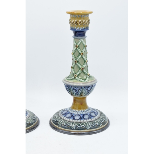 48A - A pair of Doulton Lambeth candlesticks, circa 1880, with artist's monograms to base to include Bessi... 