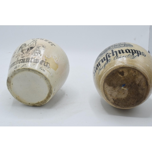 50 - A pair of stoneware flagons to include a Nordhausen Kornschnapps example and a Nordhauser Kornbranti... 