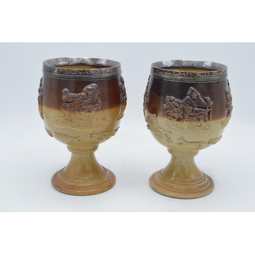 52 - A pair of 19th century stoneware goblets depicting traditional hunting and country scenes with both ... 