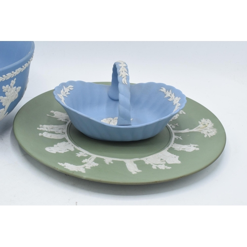 56 - A collection of Wedgwood Jasperware to include a blue bowl, blue basket and a green plate (3). In go... 