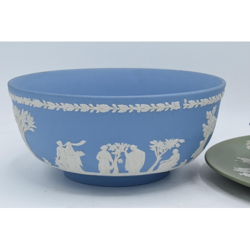 56 - A collection of Wedgwood Jasperware to include a blue bowl, blue basket and a green plate (3). In go... 