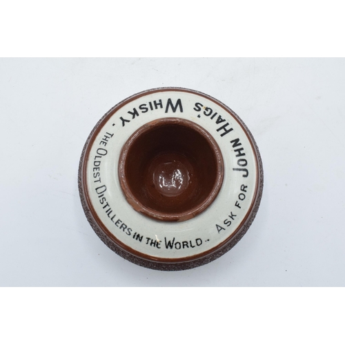 64 - An advertising match striker and holder for John Haig's Whisky. Generally in good condition with som... 