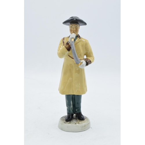 70 - A pottery figure of The Ripon Hornblower by R. Underwood. 19cm tall. In good condition with no obvio... 