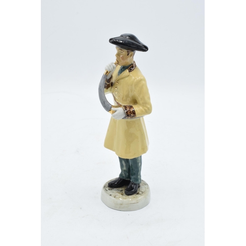 70 - A pottery figure of The Ripon Hornblower by R. Underwood. 19cm tall. In good condition with no obvio... 