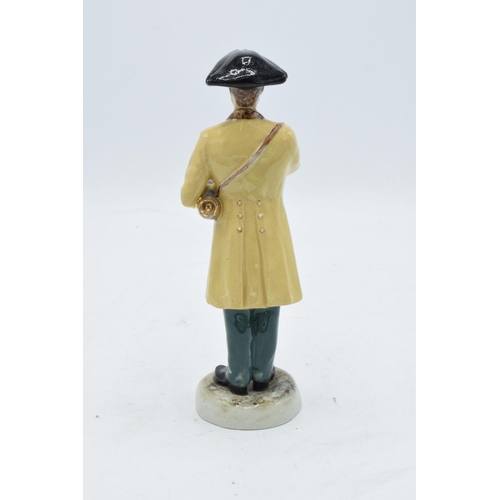 70 - A pottery figure of The Ripon Hornblower by R. Underwood. 19cm tall. In good condition with no obvio... 