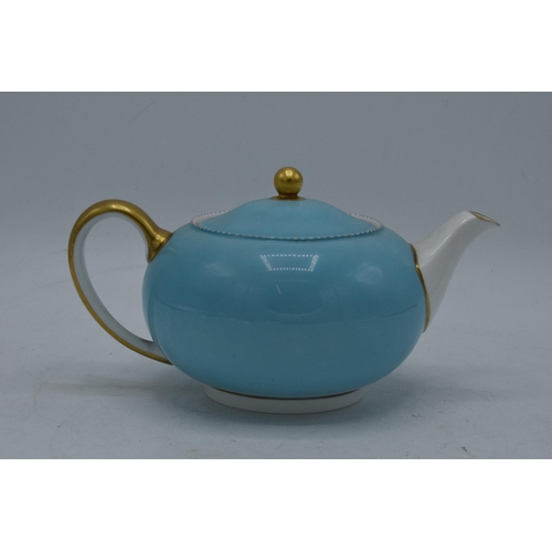 75 - Wedgwood teapot decorated with a light blue and gilded design. In good condition with no obvious dam... 