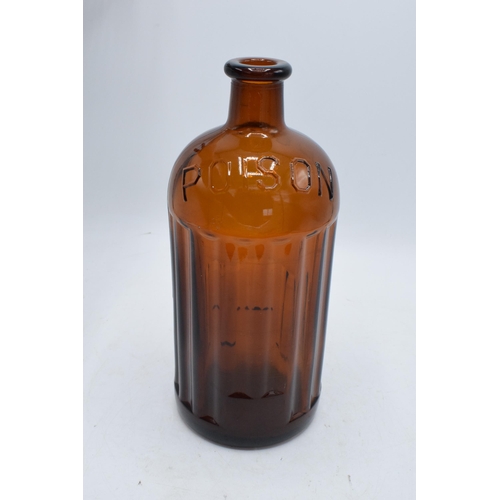 75A - A large brown glass 'Poison' bottle. 23cm tall. In good condition.