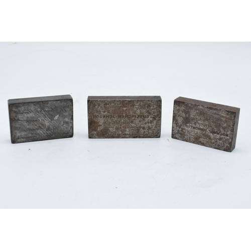 225H - A trio of steel stamp blocks or similar. 7 x 4cm largest.