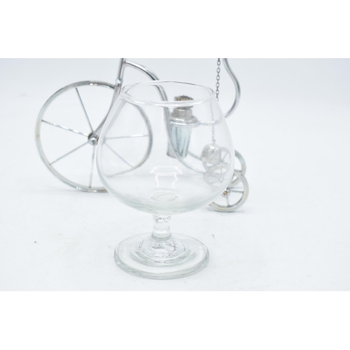 225K - A novelty silver plated brandy warmer in the form of a tricycle / penny farthing style with a glass.... 