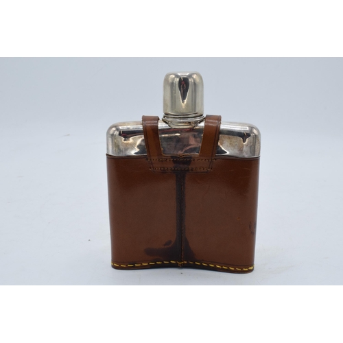 225M - Scandinavian silver and glass hipflask with a leather cover. 14cm tall.