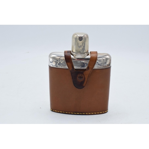 225M - Scandinavian silver and glass hipflask with a leather cover. 14cm tall.