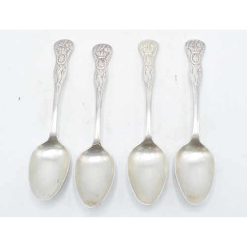 225S - A set of 4 matching white metal tea spoons with unusual pattern to handle (4). 13cm tall.