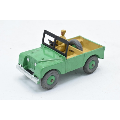 330 - Boxed Dinky Toys No. 340 Land Rover comprising of green body with matching hubs, tan interior and dr... 