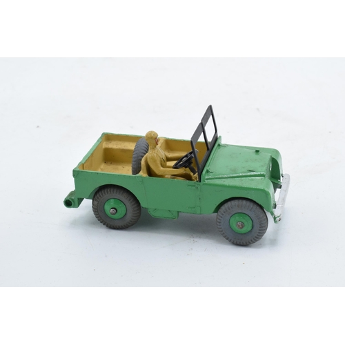 330 - Boxed Dinky Toys No. 340 Land Rover comprising of green body with matching hubs, tan interior and dr... 