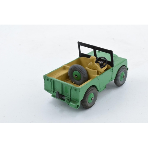 330 - Boxed Dinky Toys No. 340 Land Rover comprising of green body with matching hubs, tan interior and dr... 