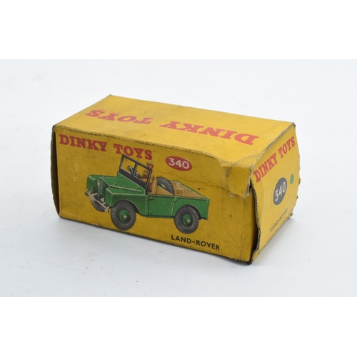 330 - Boxed Dinky Toys No. 340 Land Rover comprising of green body with matching hubs, tan interior and dr... 