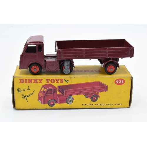 335 - Boxed Dinky Toys No.421 electric articulated lorry in maroon with red hubs and British Railways sign... 