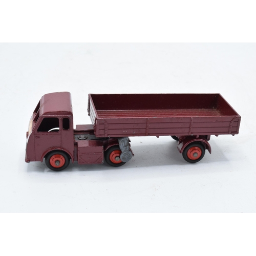 335 - Boxed Dinky Toys No.421 electric articulated lorry in maroon with red hubs and British Railways sign... 