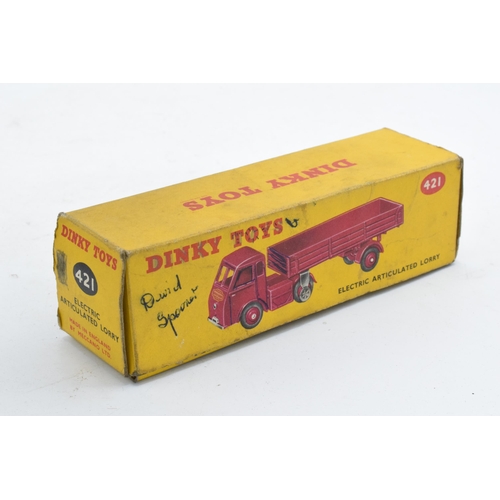 335 - Boxed Dinky Toys No.421 electric articulated lorry in maroon with red hubs and British Railways sign... 