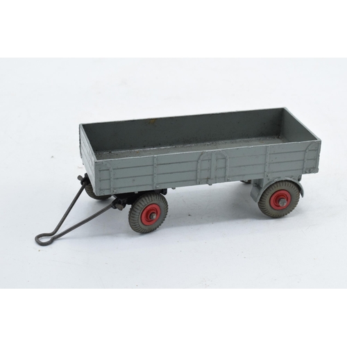 336 - Boxed Dinky Toys 428 Trailer (large) in grey with red hubs. VGC with occasional mark. Box fair to go... 