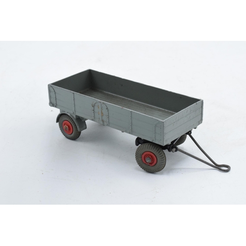 336 - Boxed Dinky Toys 428 Trailer (large) in grey with red hubs. VGC with occasional mark. Box fair to go... 