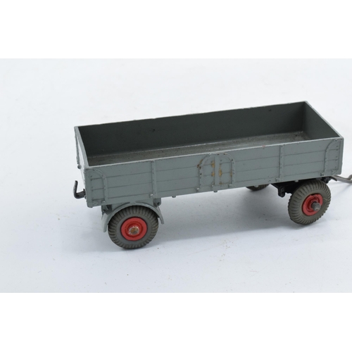 336 - Boxed Dinky Toys 428 Trailer (large) in grey with red hubs. VGC with occasional mark. Box fair to go... 