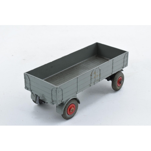 336 - Boxed Dinky Toys 428 Trailer (large) in grey with red hubs. VGC with occasional mark. Box fair to go... 