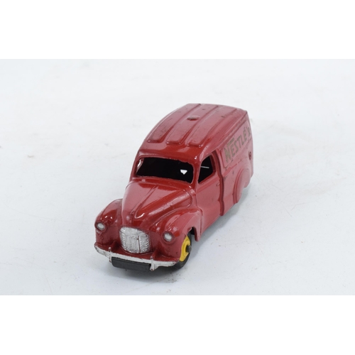 338 - Boxed Dinky Austin Van 'Nestles' No 471. Box taped. In good condition with some evidence of use and ... 