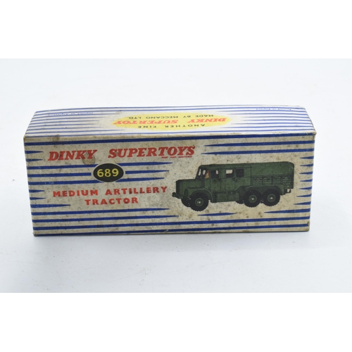 340 - Boxed Dinky Supertoys 689 Medium Artillery Tractor. In good condition with some evidence of use and ... 