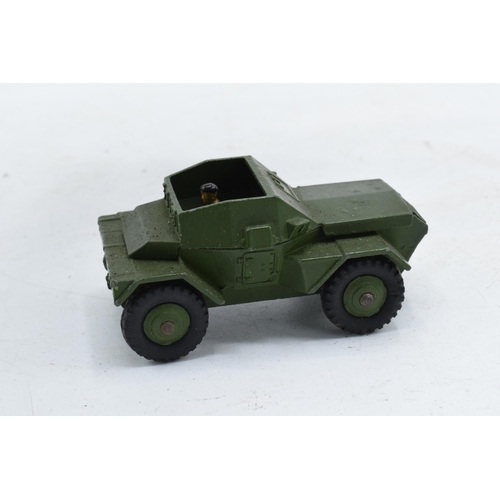 348 - Boxed Dinky Toys 673 Scout Car. In good condition with some evidence of use and play-wear such as sm... 