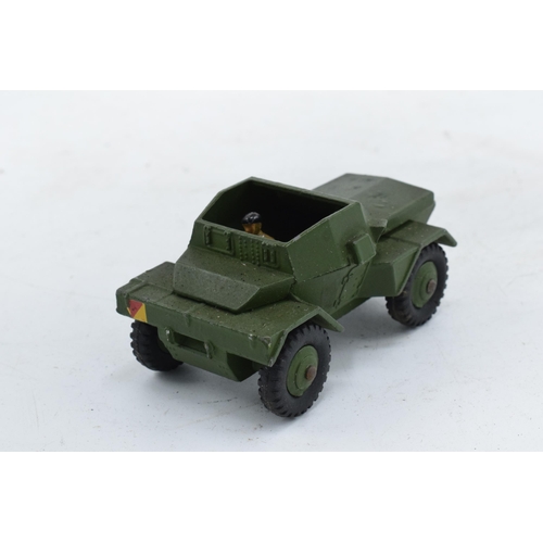 348 - Boxed Dinky Toys 673 Scout Car. In good condition with some evidence of use and play-wear such as sm... 