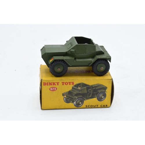 351 - Boxed Dinky Toys 673 Scout Car. In good condition with some evidence of use and play-wear such as sm... 