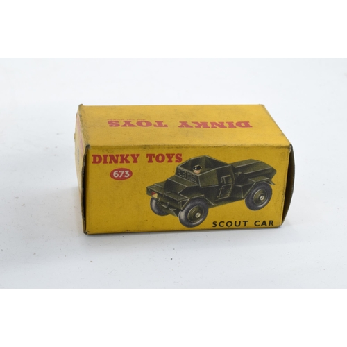 351 - Boxed Dinky Toys 673 Scout Car. In good condition with some evidence of use and play-wear such as sm... 