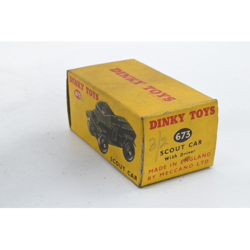 351 - Boxed Dinky Toys 673 Scout Car. In good condition with some evidence of use and play-wear such as sm... 