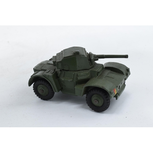 353 - Boxed Dinky Toys 670 Armoured Car. In good condition with some evidence of use and play-wear such as... 