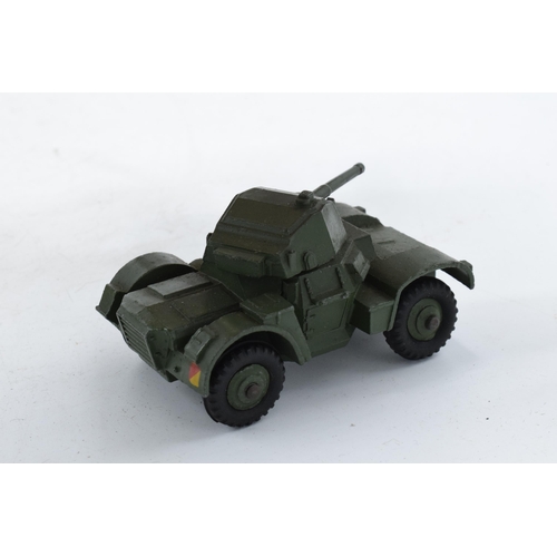 353 - Boxed Dinky Toys 670 Armoured Car. In good condition with some evidence of use and play-wear such as... 