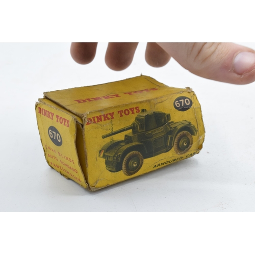 353 - Boxed Dinky Toys 670 Armoured Car. In good condition with some evidence of use and play-wear such as... 