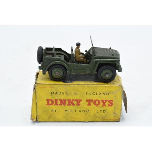 357 - Boxed Dinky Toys Austin Champ 674. One figure. In good condition with some evidence of use and play-... 