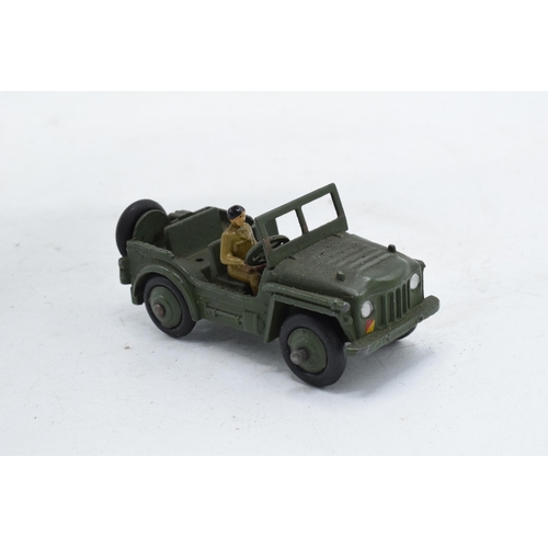 357 - Boxed Dinky Toys Austin Champ 674. One figure. In good condition with some evidence of use and play-... 