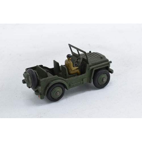 357 - Boxed Dinky Toys Austin Champ 674. One figure. In good condition with some evidence of use and play-... 