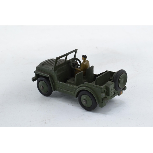 357 - Boxed Dinky Toys Austin Champ 674. One figure. In good condition with some evidence of use and play-... 