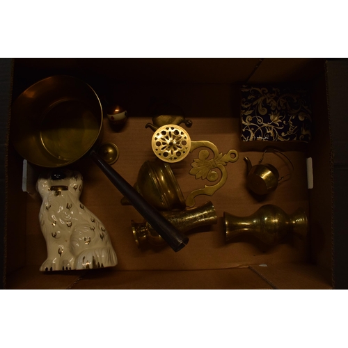 21 - A mixed collection of items to include brass saucepan, brassware, pottery, commemorative mugs etc. C... 