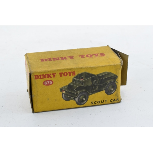 348 - Boxed Dinky Toys 673 Scout Car. In good condition with some evidence of use and play-wear such as sm... 