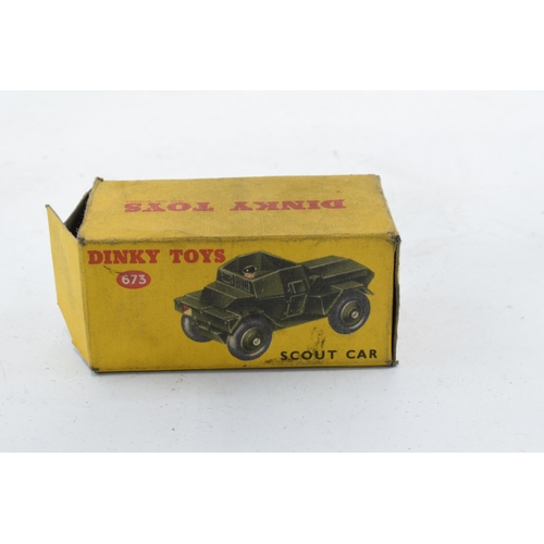 348 - Boxed Dinky Toys 673 Scout Car. In good condition with some evidence of use and play-wear such as sm... 