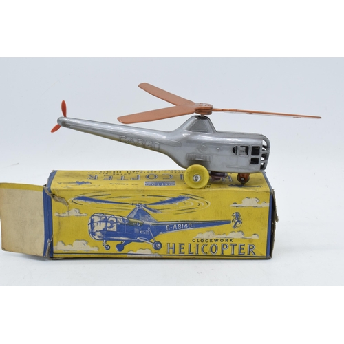 379 - Boxed Mettoy clockwork driven helicopter. Working order. In good condition.