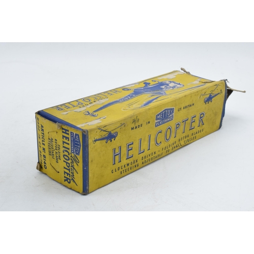 379 - Boxed Mettoy clockwork driven helicopter. Working order. In good condition.